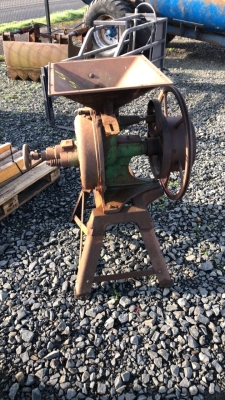 Antique corn crusher with handle