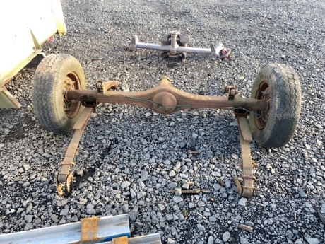 Trailer axel with springs