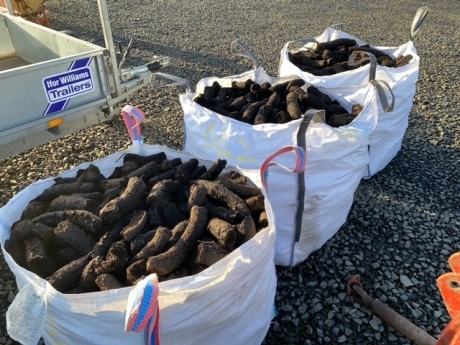 3 tote bags of peat