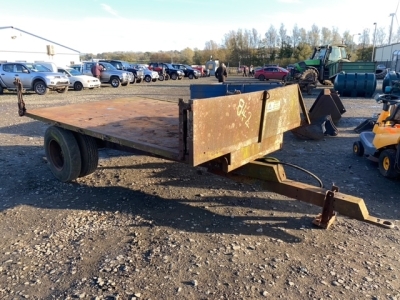 Twin wheeled tipping tractor trailer