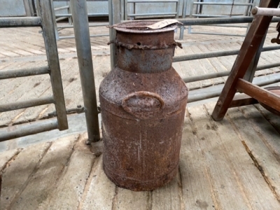 Old steel creamery can