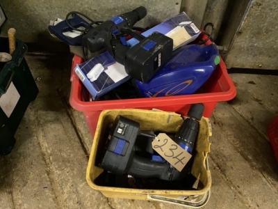 2 tubs of drills, saw etc