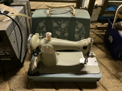 sewing machine, working