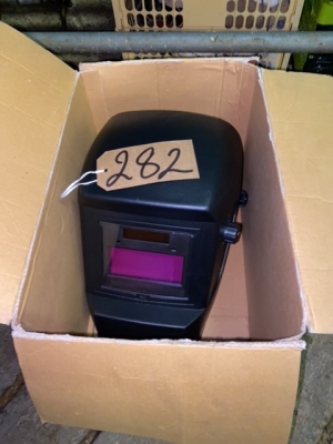 New welding mask in box