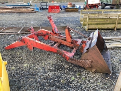 Massey Ferguson power loader with brackets and bucket