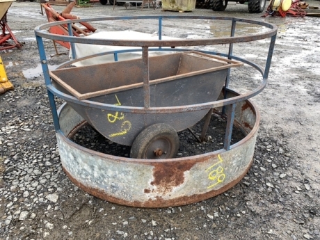 Sheep round bale feeder and meal trolley