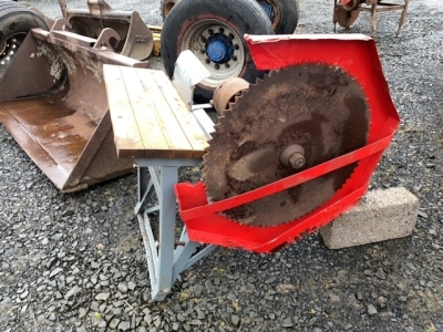 Ferguson saw bench complete with pulley for tractor and extra fittings pulley in office