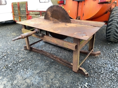 Bench PTO saw with slip clutch in shaft