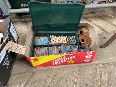 Box lot of cast iron wheels and nails