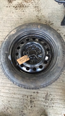 Brand new bridgestone wheel and rim 15"