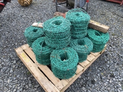 pallet of barbed wire green unused