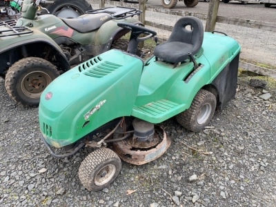 Green ride on lawnmower, requires a cutting deck, engine good