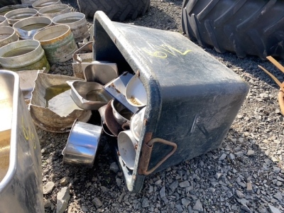 Builders mortar tub with selection of dog feed dishes