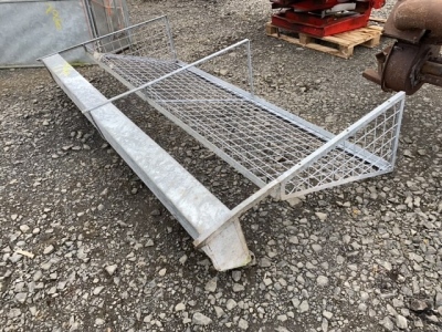 Wall mounted hay rack and feed trough