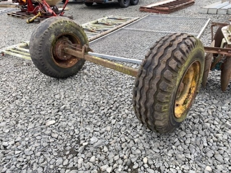 Axle for weeks trailer with 10-75-15.3 wheels