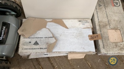 2 boxes approx 2x1ft tiles