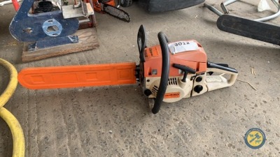 440 chainsaw with Stihl stickers on it