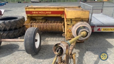 Sperry New Holland 940 with shaft