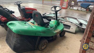 Green ride on lawnmower