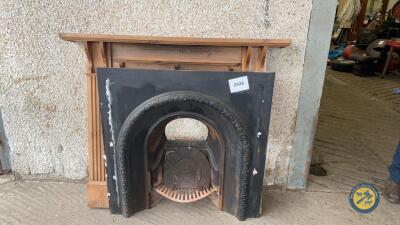 Fireplace with wooden surround