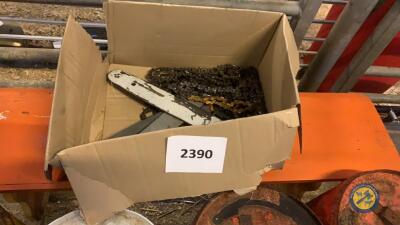 Box of chainsaw parts
