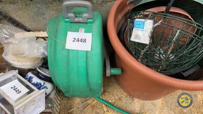 Retractable garden hose reel