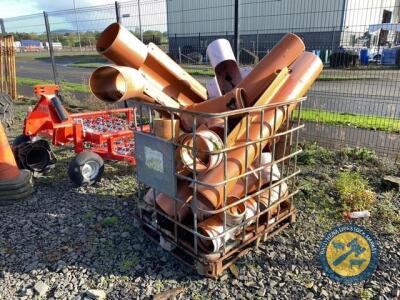 Crate of sewer pipe fittings of various sizes & shapes