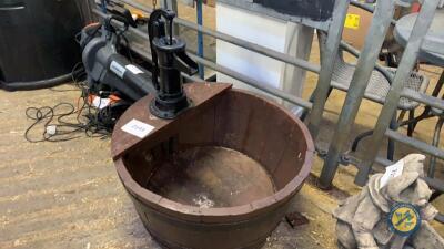 Cast iron water pump fitted to wooden tub