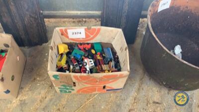 Box of toy vehicles