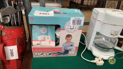 Childs sewing machine