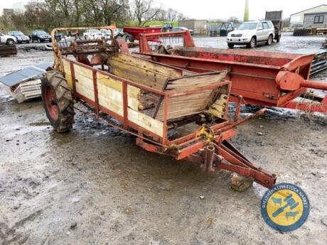 Wooden sided ground driven manure spreader