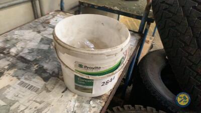 Bucket of assorted dairy parts