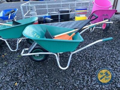 Green wheelbarrow with scrapper & shovel