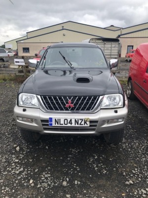 Mitsubushi L200 black/silver MOT-Jan 2021 137,000miles. Good pulling jeep, puncture in back wheel